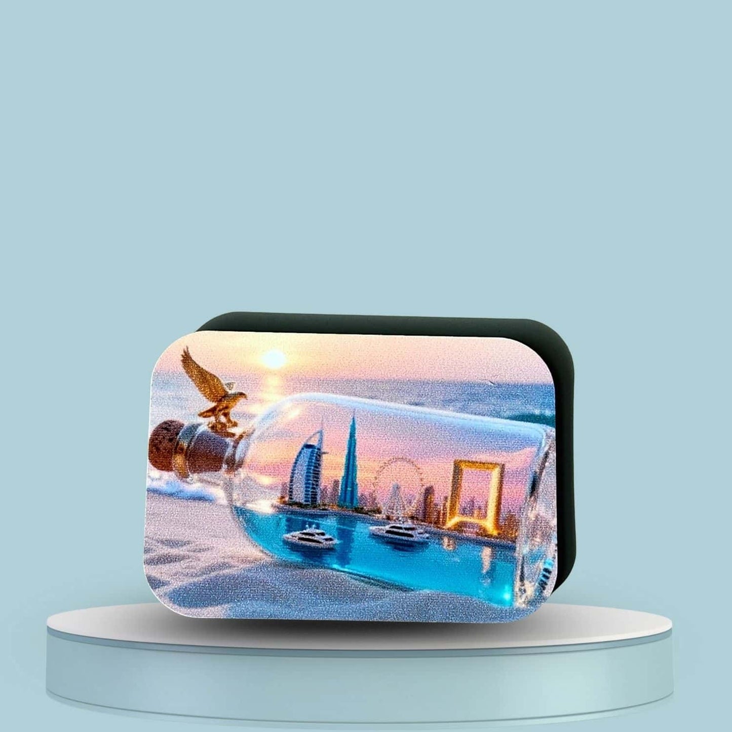 Custom rounded rectangle magnet from InkFluenceME with UV-printed Dubai skyline in a bottle, featuring an eagle. Personalized Dubai souvenir.
