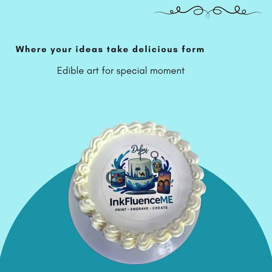 Product image for InkFluenceME edible printing service in Dubai. At the top, the text reads "Where ideas take delicious form" and "Edible art for special moment." The central focus is a round edible print placed on top of a frosted cake, showcasing the InkFluenceME logo, "Dubai" text, and various custom designs including a mug, phone case, and a key chain. The light blue/teal background of the image canvas closely matches the InkFluenceME brand's logo color theme.