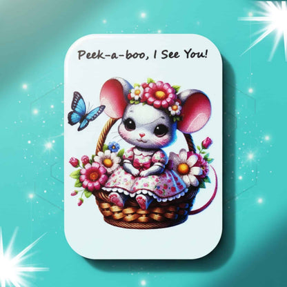 Personalized rounded rectangle magnet with a cute cartoon mouse in a floral dress, sitting inside a basket of pink and white flowers, with a blue butterfly and 'Peek-a-boo, I See You!' text.
